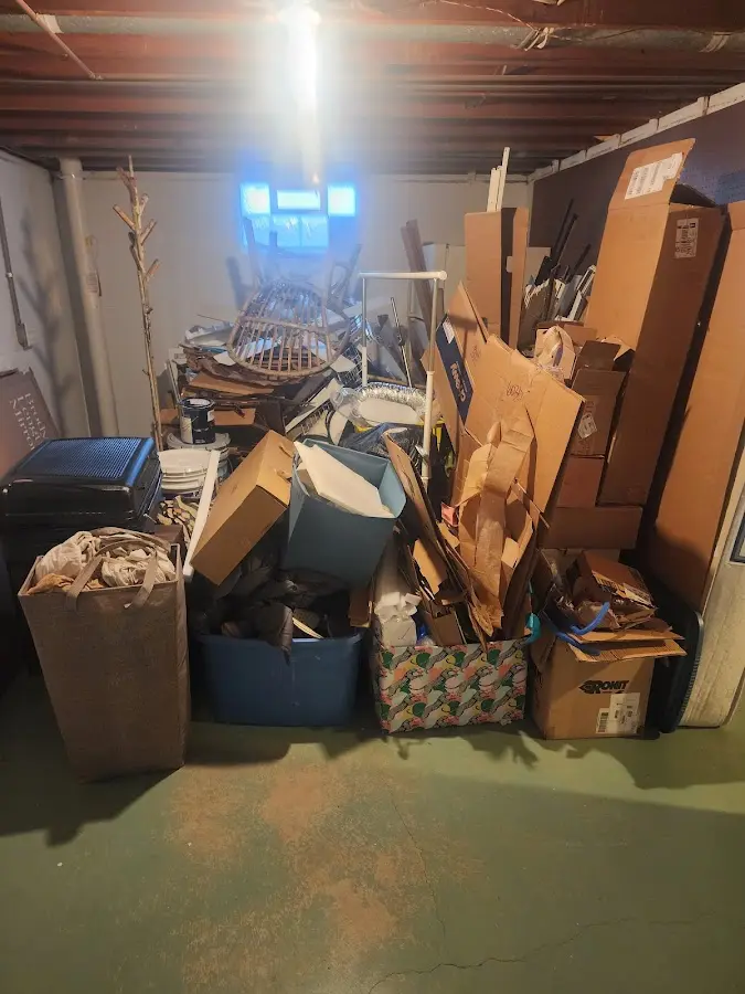 Roll-off dumpster container at job site for 2 Yard Dumpster Rental in Omak